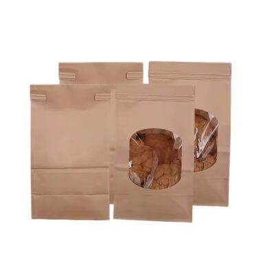 Kraft paper pouch with clear window and sealed closure for snacks and cookies