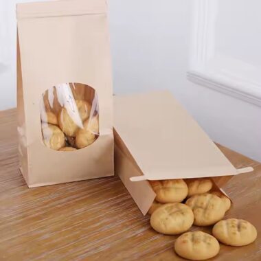 Kraft paper pouch with clear window and sealed closure for snacks and cookies