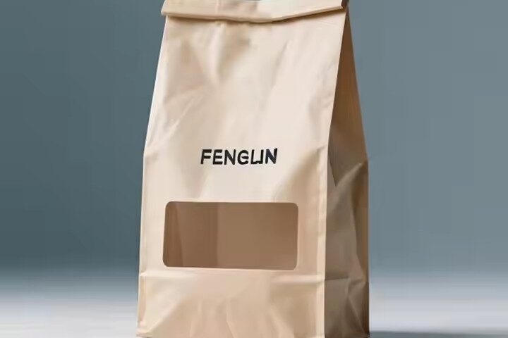 Kraft paper pouch with clear window and sealed closure for snacks and cookies