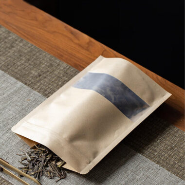 Resealable kraft paper food pouch with transparent window