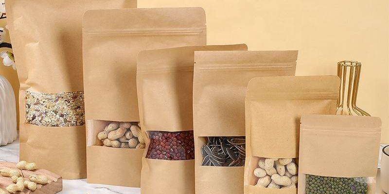 Yellow kraft pouch with window for reusable dry food packaging