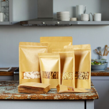 Yellow kraft pouch with window for reusable dry food packaging